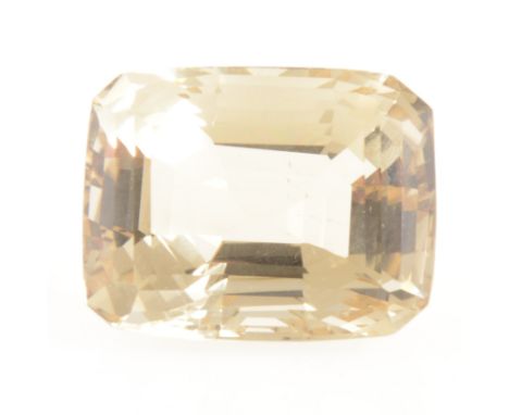 A loose stone - step cut smoky quartz, 37mm x 29mm x 22mm, approx. 156.39 carats.