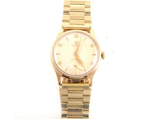 Omega - a gentleman's 9 carat yellow gold wrist watch, circular champagne baton dial with even arabics and subsidiary seconds