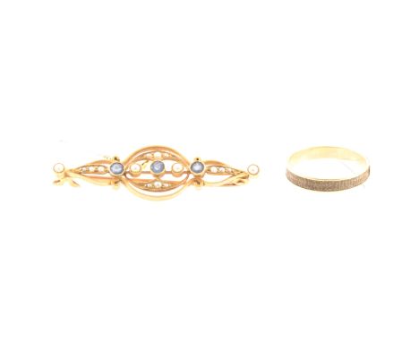 A seed pearl bar brooch and hair ring, the 45mm bar brooch marked 15ct and set with seed pearls and three untested pale blue 