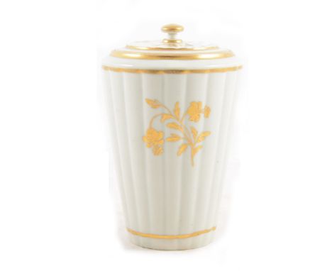 English porcelain tea caddy and cover, probably Caughley, late 18th century, gilt motifs to the tapering fluted body, unmarke