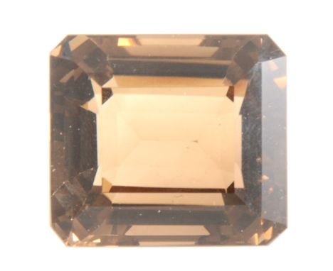 A loose stone - step cut smoky quartz, 29mm x 25mm x 22mm, approx. 105.67 carats.