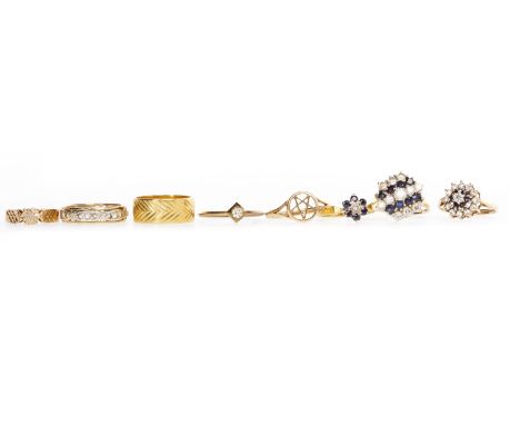 TWO EIGHTEEN CARAT GOLD RINGSone set with blue gems, the other a wedding band, 8.5g gross; along with two nine carat gold gem