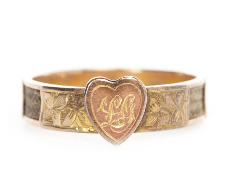 EARLY TWENTIETH CENTURY NINE CARAT GOLD HAIRWORK MOURNING RINGwith an overlaid heart shaped motif with engraved monogram, the