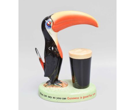 A Carltonware Advertising Guinness Tablelamp, surmounted by a toucan£80-120Wear around lamp fixture hole, tail restored, gene