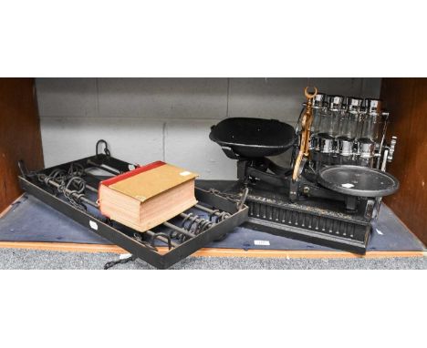 A Set of Cast Iron Weighing Scales by Parnall, a chrome condiment set and stand, an iron pan rail and a copy of Mrs Beeton's 
