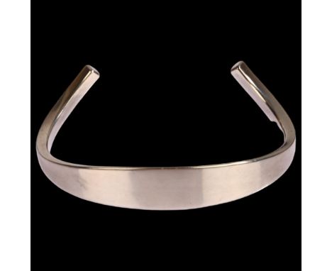 FRANK AHM - a Danish modernist sterling silver plain form cuff bangle, model no. 580, setting height 11.5mm, internal circumf