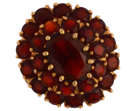 A Continental 18ct gold garnet oval cluster ring, set with oval mixed and round-cut garnets, setting height 20.9mm, size L, 6