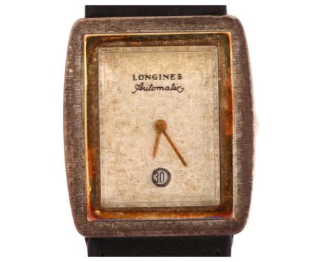 LONGINES-WITTNAUER - a sterling silver and 14k gold automatic wristwatch, textured silvered dial with gilt hands, cyclops dat
