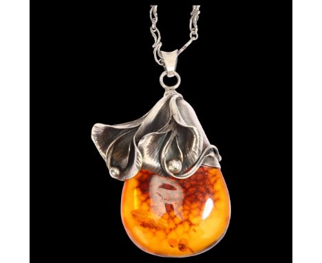 A large amber and silver flower drop design pendant and chain, pendant length excluding bale 58mm, 51gNo damage or repairs, l