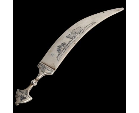 An Iraqi sterling silver and niello saber design paper knife, length 15cmGood condition, very light rubbing through handling,