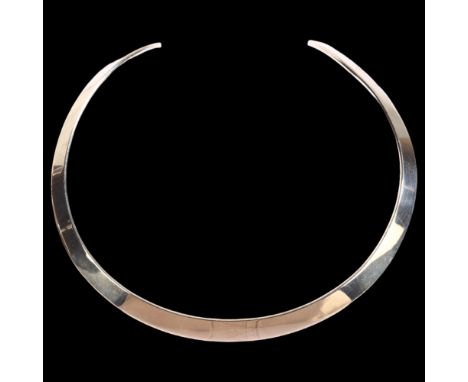 N E FROM - a Danish sterling silver neck torque, width at widest part 10mm, 41.5gGood bright condition, a few very light surf