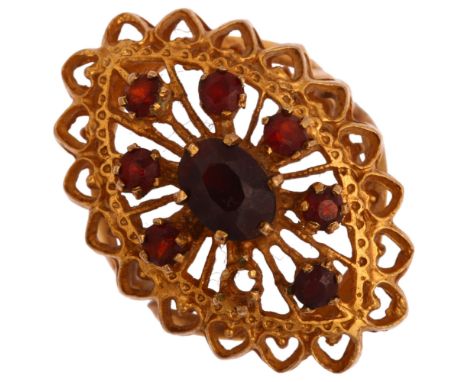 A late 20th century 9ct gold garnet openwork marquise cluster ring, setting height 27.1mm, size O, 5.9gNo damage or repair, 1