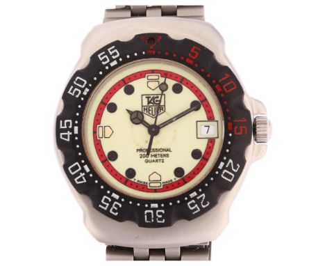 TAG HEUER - a mid-size stainless steel Formula 1 quartz bracelet watch, ref. WA1211, luminous dial with black dot and Tag emb