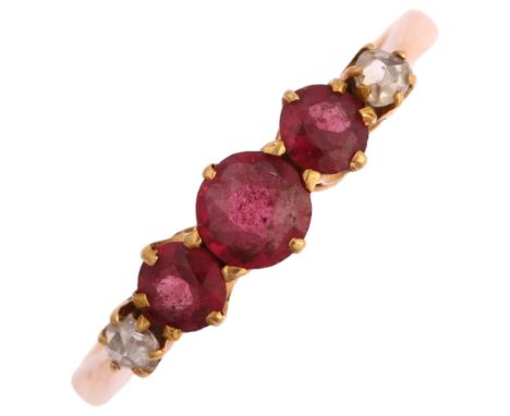 A graduated five stone ruby and diamond half hoop ring, unmarked gold settings with round-cut rubies and rose-cut diamonds, s