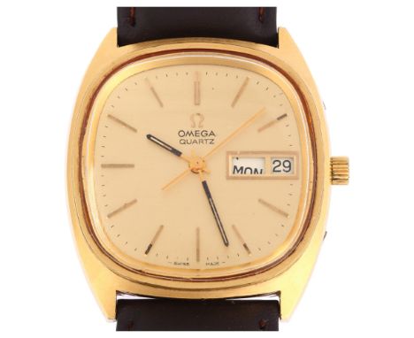 OMEGA - a gold plated stainless steel Day/Date quartz wristwatch, ref. 196.0066, circa 1975, champagne dial with applied gilt