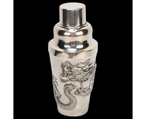 A Chinese heavy gauge silver cocktail shaker, the body having relief moulded dragon, by Wang Hing, marked 90, 17.75oz, height