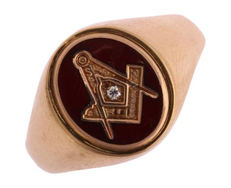 A modern 9ct gold red enamel and diamond Masonic signet ring, setting height 14.3mm, size T, 7.9gNo damage or repairs, hallma