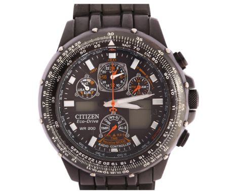 CITIZEN - a black PVD stainless steel Eco-Drive Skyhawk radio controlled quartz chronograph bracelet watch, ref. U600-S053030