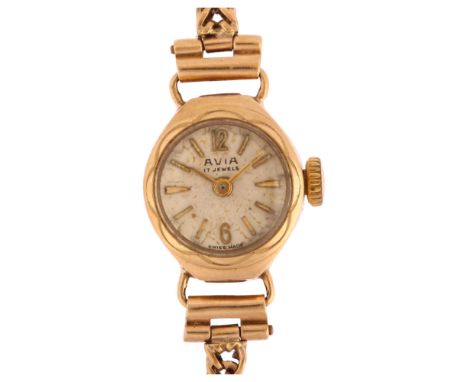 AVIA - a lady's 9ct gold cocktail mechanical wristwatch, silvered dial with applied gilt halfly Arabic numerals and 9ct foxta