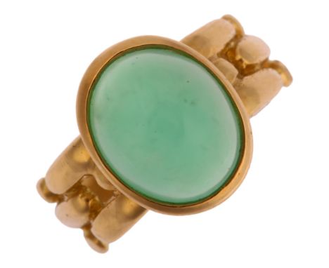 An Italian 18ct gold green chalcedony dress ring, set with oval cabochon chalcedony, setting height 14.1mm, size O, 6.9gNo da
