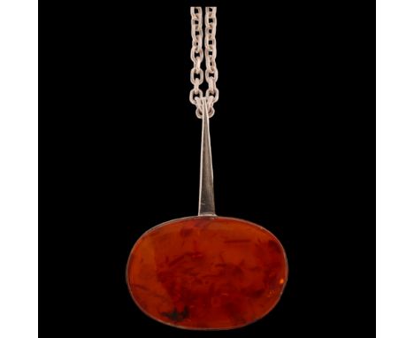 N E FROM - a Danish sterling silver amber set abstract pendant on silver chain, pendant length 55mm, 31gGood condition 