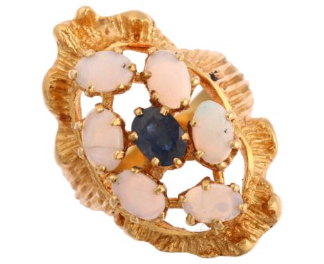 A late 20th century sapphire and opal openwork cluster ring, unmarked gold textured settings, with oval-cut sapphire and oval