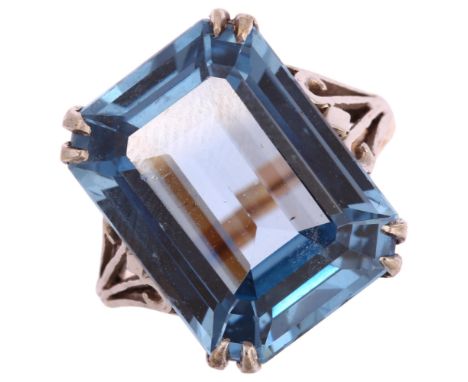 A 9ct gold blue topaz dress ring, setting height 16.4mm, size K, 5.1gNo damage or repair, mark clear, engraved 9c 