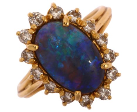 A modern 18ct gold black opal and diamond oval cluster ring, set with oval cabochon opal and modern round brilliant-cut diamo