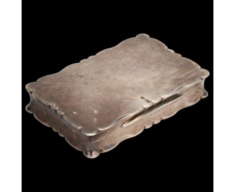 An Edwardian rectangular silver snuffbox, with concave side and scalloped edges, Stokes & Ireland Ltd, Chester 1901, 4.5oz, 9