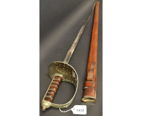 An officer's cavalry sword, the blade etched with the royal cypher GvR, scabbard en suite