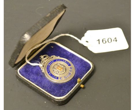 A Nottinghamshire Football Alliance silver and enamel medallion, cased