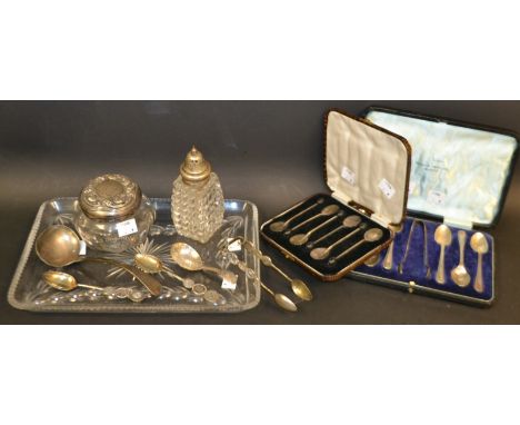 A George IV silver caddy spoon, London 1824; a set of six silver coffee bean  coffee spoons, cased; a set of six silver teasp
