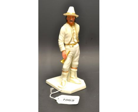 A Royal Worcester figure, of an Italian, he stands wearing a pointed hat, holding a horn, canted base, picked out in gilt , 1