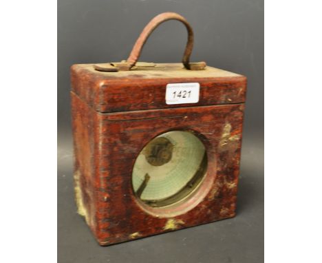 A Toulet Imperator pigeon racing clock, wooden carry case, leather strap handle, 17.5cm high