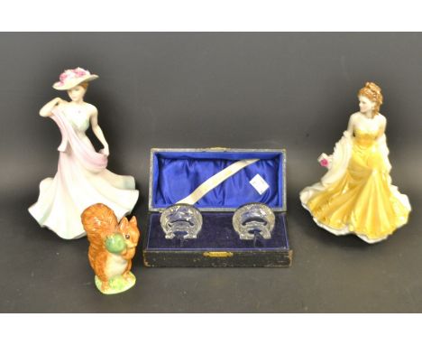 A pair of silver mounted table salts, cased; a Royal Worcester figure, Golden Moments; a Coalport figure; a Royal Albert Squi