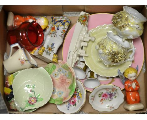 A pair of Continental figures of angels praying; a unusual Victorian ruby glass jug; a crested ware model of H.M.S. Lion; Car