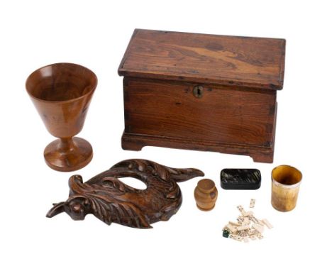 A 19th century olive wood goblet, 16cm high, a treen carving, a horn beaker, a treen box, a snuff box, miniature bone dominoe
