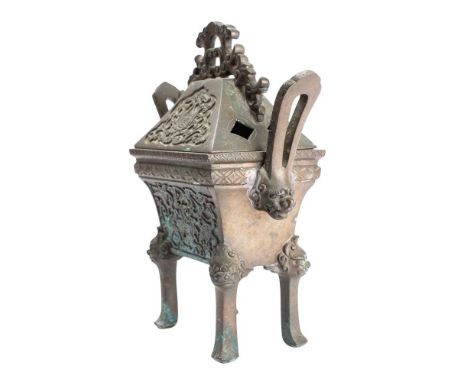 A Chinese bronze censer and cover of archaic design, the rectangular domed cover with pierced handle, the censer with swept l