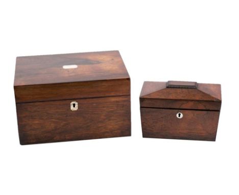 A 19th century rosewood vanity box of rectangular outline, the hinged lid enclosing a fitted interior with lift-out tray and 