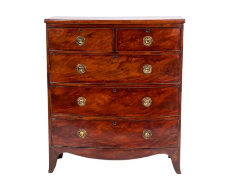 A George III mahogany bow front chest of drawers,  last quarter 18th century; with two short and three long drawers, all with