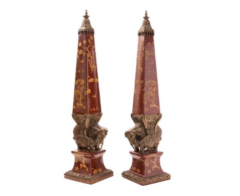 A pair of late 20th century ceramic and metal mounted obelisks in the Indian style, decorated with deer and butterflies on an