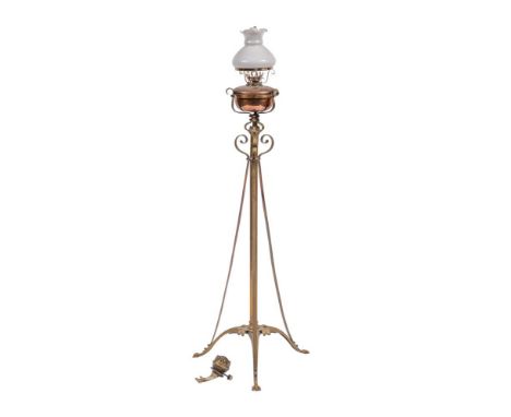 A Victorian brass and copper telescopic standard lamp, late 19th century; with later associated milk glass shade and supporti