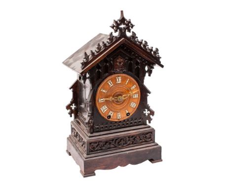 A Victorian Black Forest cuckoo mantel clock,  the eight-day duration, double-fusee movement striking the hours on a gong wit