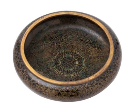 A Chinese cloisonne bowl centred with the emblem for longevity with coiled scale decoration to a black ground, bears four cha