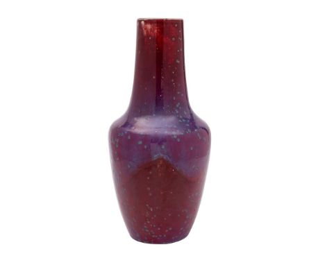 A large Ruskin high-fired vase, dated 1932 with tapering cylindrical neck, covered in a rich flambé and lavender glaze speckl