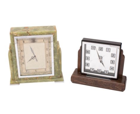 An Art Deco green onyx mantel clock having an eight-day duration timepiece movement, the cream and gilt rectangular dial with