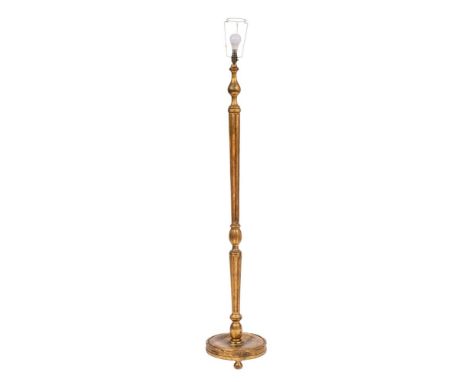 A Continental giltwood standard lamp, early 20th century; with knop turned and fluted shaft and cushion moulded circular base