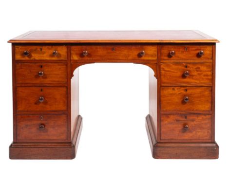 A Victorian mahogany pedestal desk in George III style, third quarter 19th century; by Gillow of Lancaster; the rectangular t