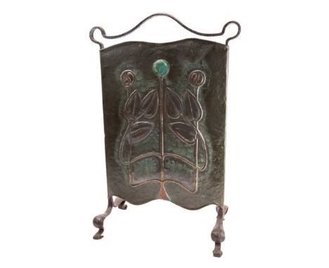 An Art Nouveau copper fire screen, the hammered copper panel with Ruskin-type enamel cabochon and embossed stylised foliate m