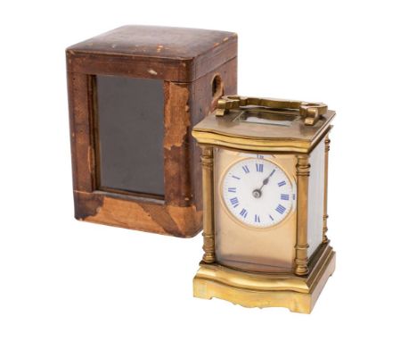 An Edwardian French brass carriage clock, the eight-day duration timepiece movement having a platform cylinder escapement, wi